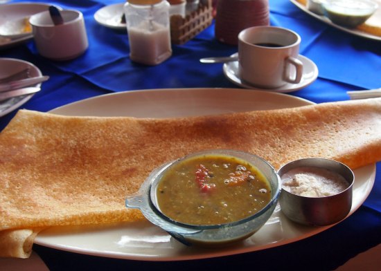 Indian food. Dosa with sambol and cconut chutney. A South Indian dish.