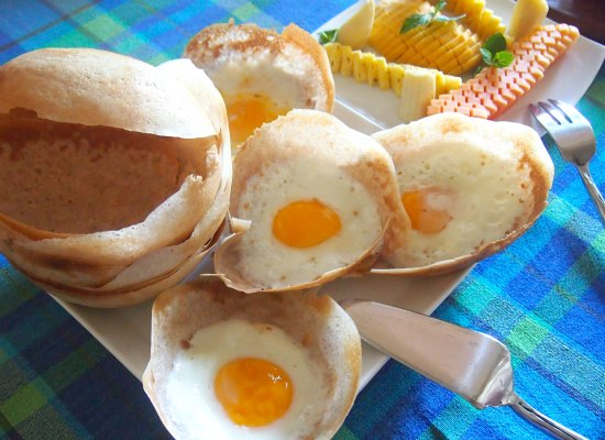 Sri Lankan breakfast food. Max Wadiya villa Sri Lanka egg hoppers