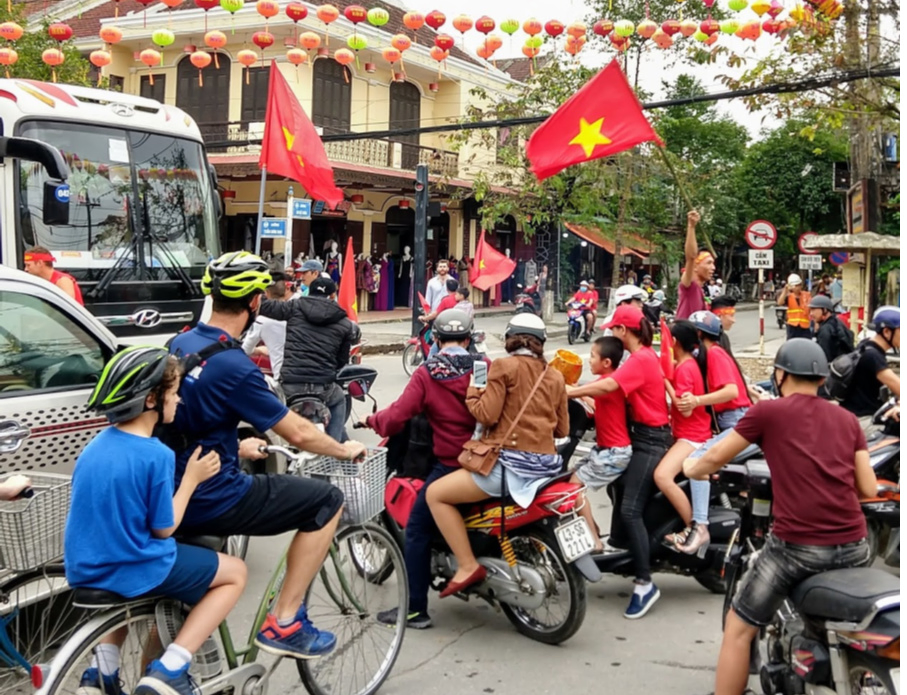 Vietnam transport bikes, motorbikes cars and buses organised chaos